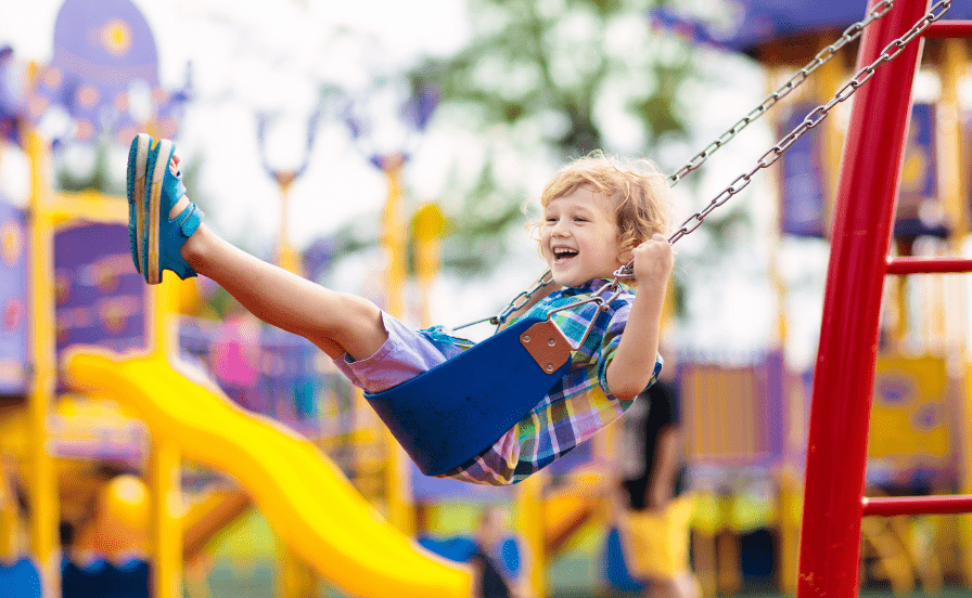 Photographing Toddlers boy on swing